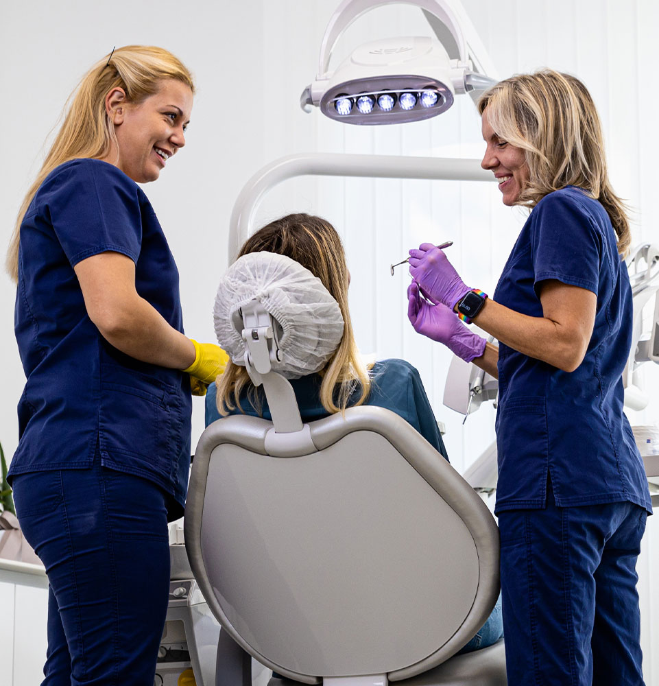 anesthesiologist talking to dental patient